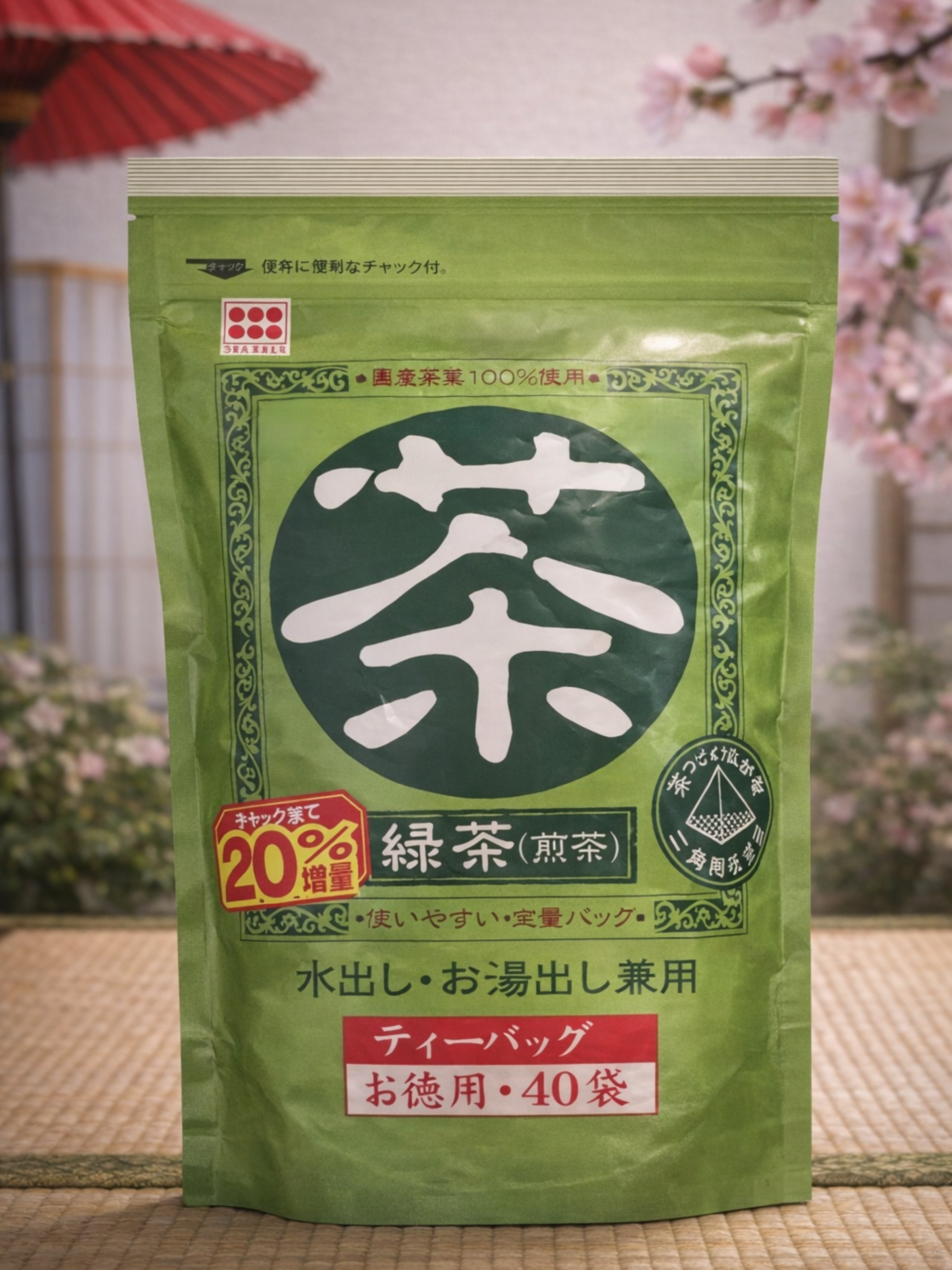 Green tea package with Japanese text and a red umbrella in the background