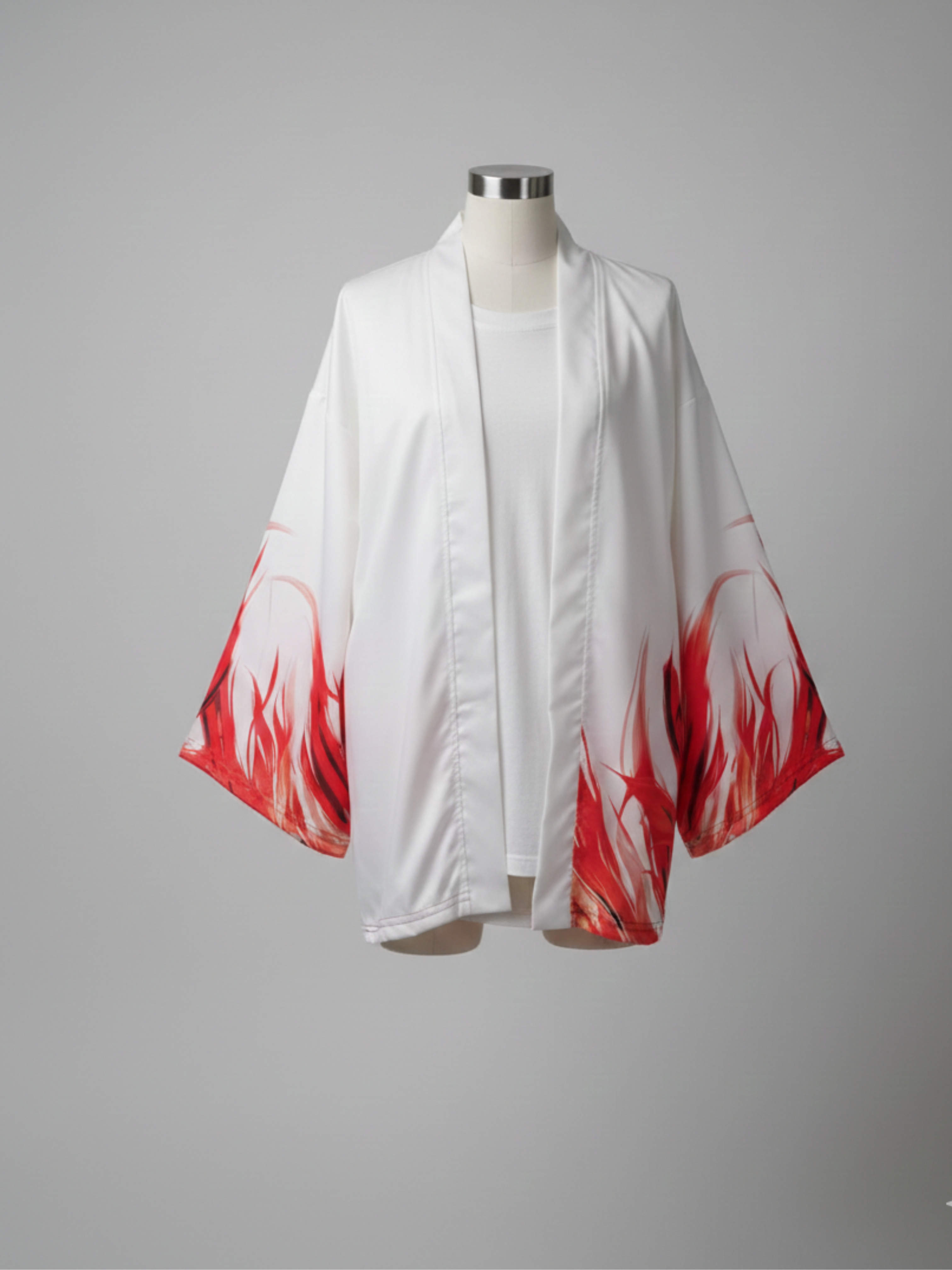 White kimono with red flame design on a mannequin against a gray background