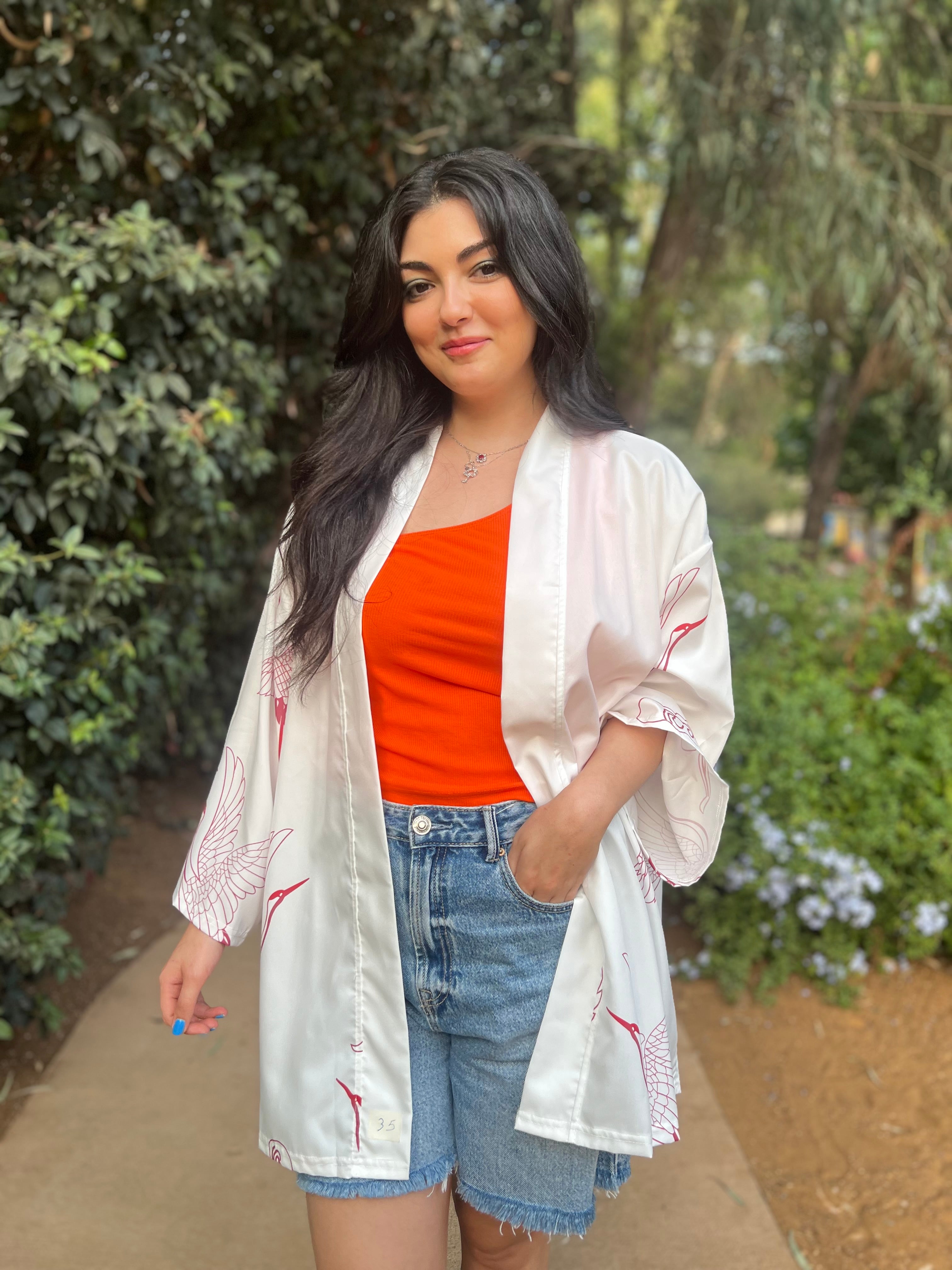 White kimono with pink feathered bird 